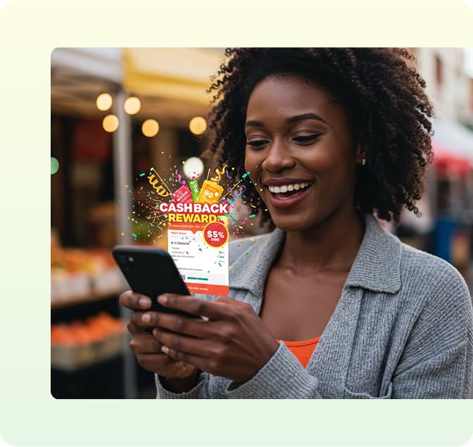 A woman on her phone after winning a cashback reward and smiling
